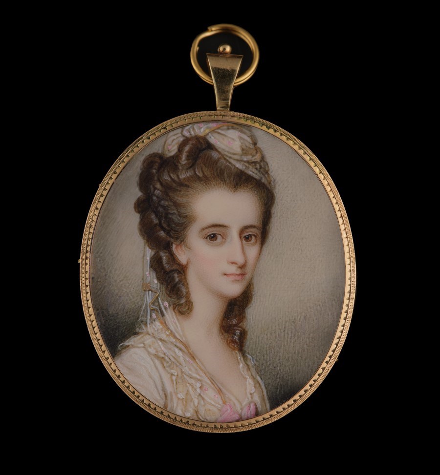 Portrait miniature of a Lady, wearing lace dress with pink embroidery, pink satin bow, a matching turban in her brown hair
